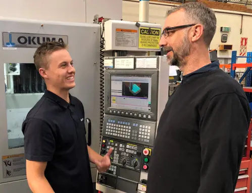 Pictured left to right: Facteon Tradesman, Patty Walsh, reflects on his apprenticeship journey with Manufacturing Manager, Phil Webb.